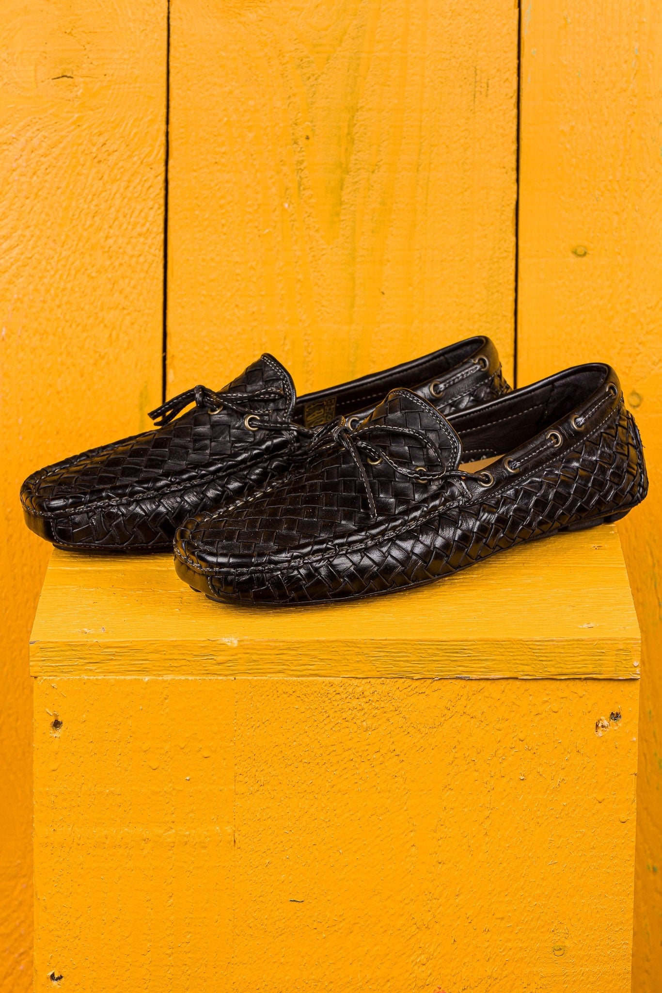 Front angled view of Benheart Innocenti E951 woven black leather driving moccasins.