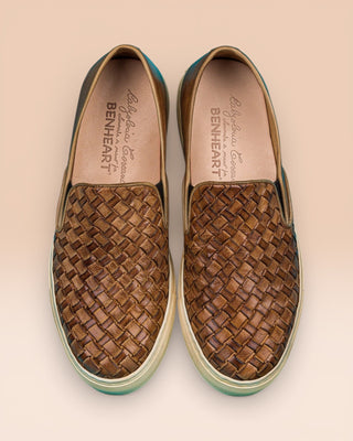 Top view of Iris unisex woven slip-on shoes in cerro leather with rubber soles.