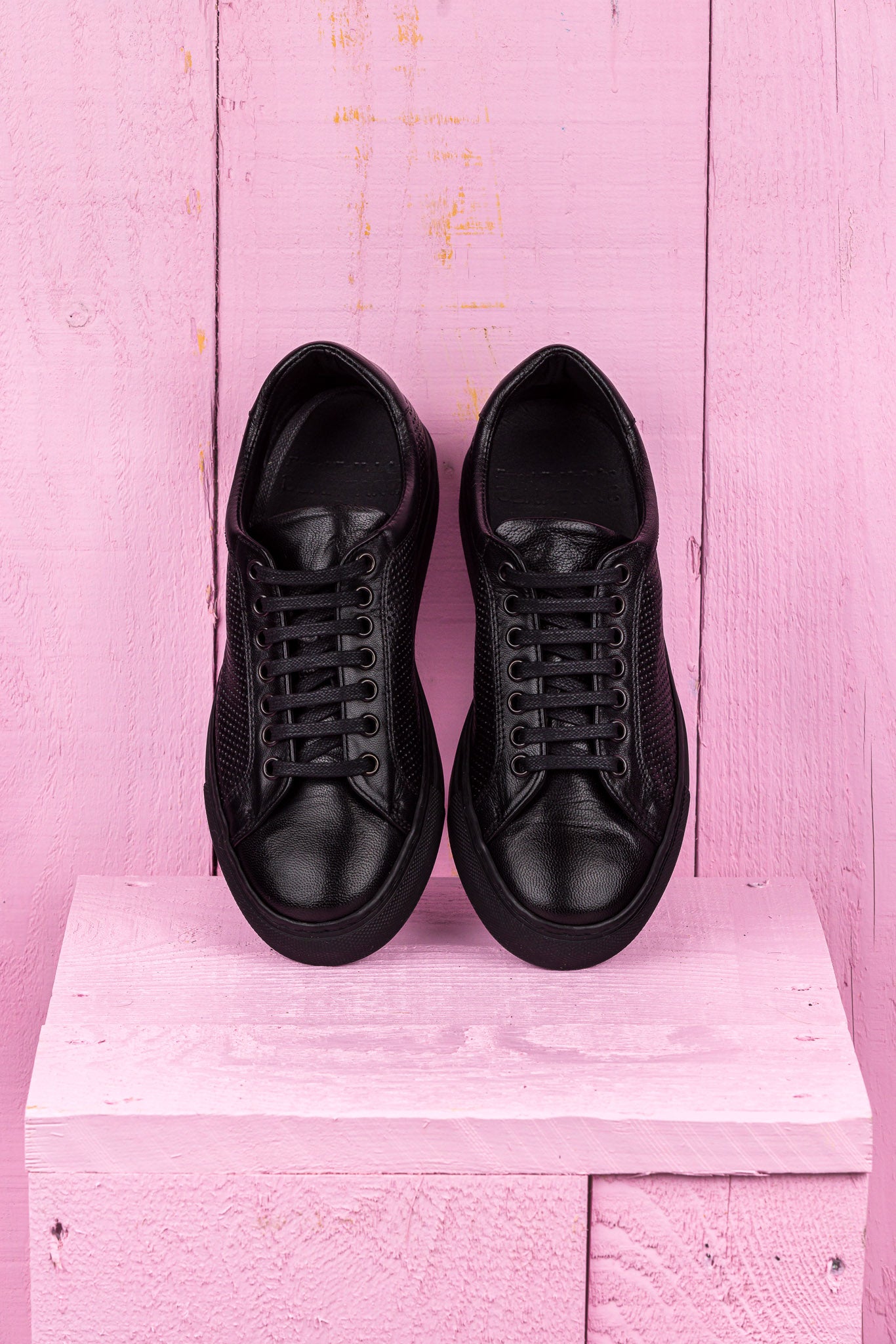 Top view of Benheart Lario unisex perforated leather sneakers shoes in black color, handcrafted in Italy