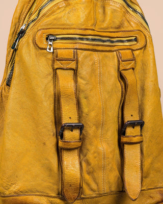 Benheart Lorenzo leather backpack in mahogany, close-up detail showing craftsmanship and texture.