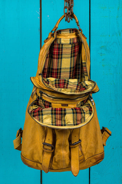 Benheart Lorenzo unisex leather backpack in mahogany, front view with open compartments showing interior.