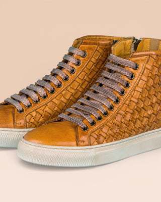 Close up view of Raimondo 8393 unisex mahogany woven high-top sneakers with rubber soles.