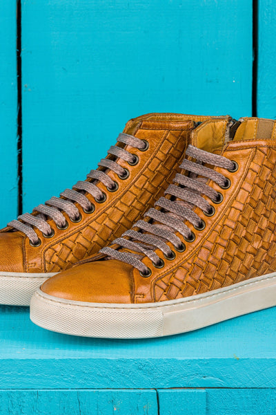 Close up view of Raimondo 8393 unisex mahogany woven high-top sneakers with rubber soles.