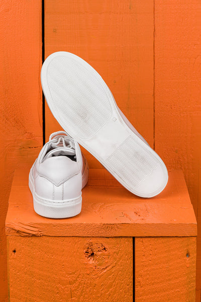Rear view of Venus unisex white leather sneakers by Benheart.