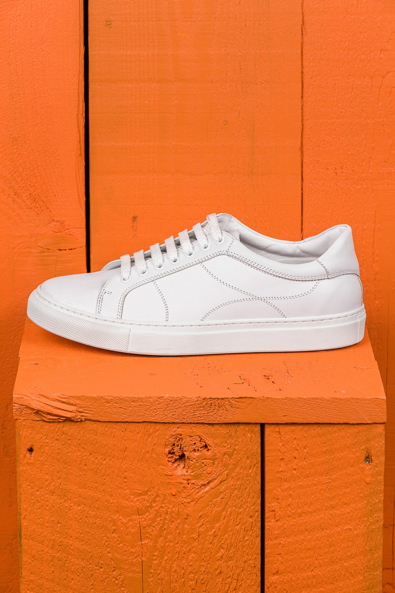 Side view of Venus unisex white leather sneakers by Benheart.